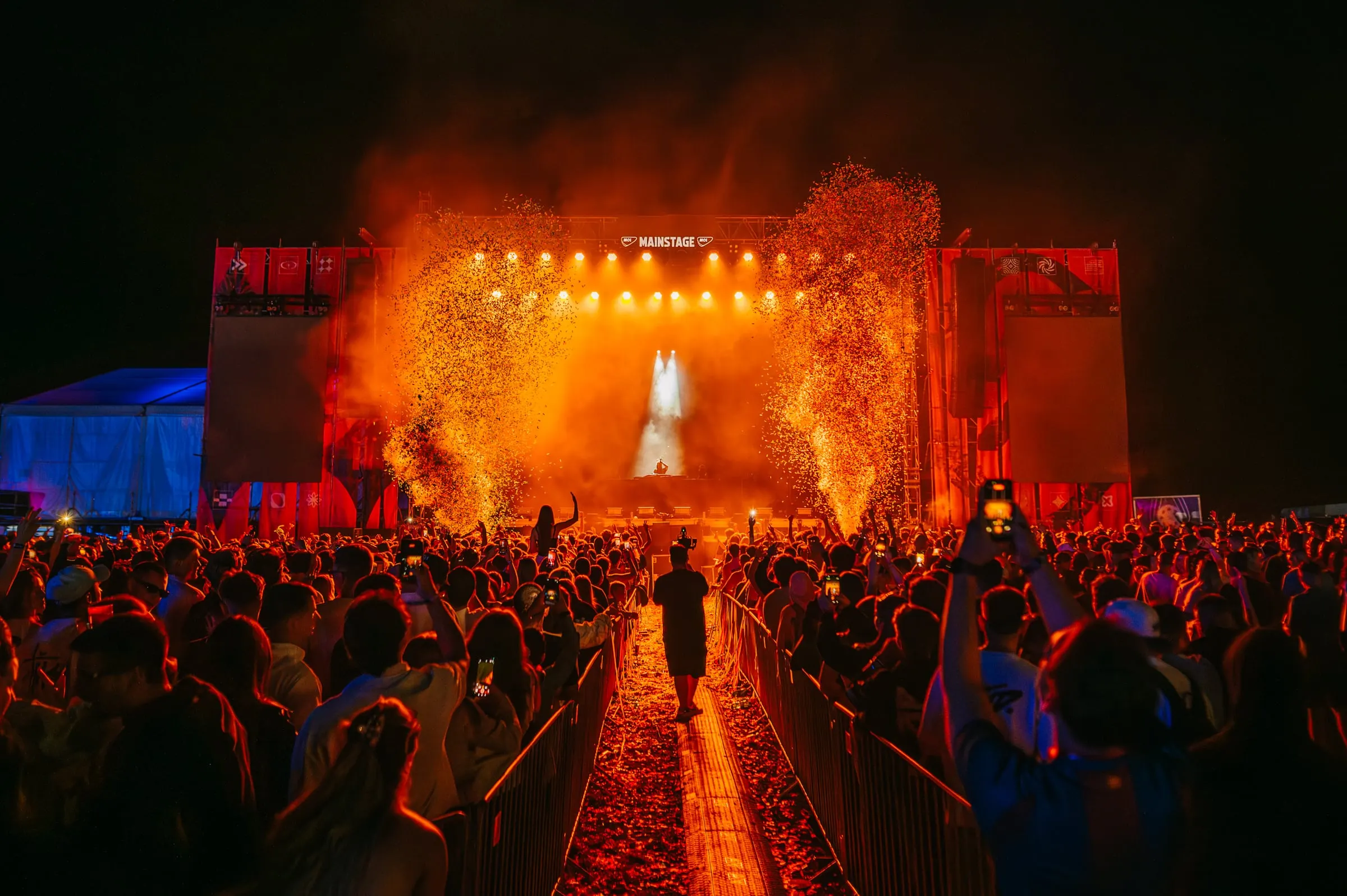 Festival stage with lights and crowd · Festivals · FBMark Events